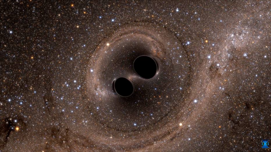 Fusão de buracos negros