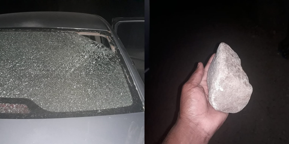 A pedra utilizada pelo suspeito perfurou o vidro traseiro do veículo